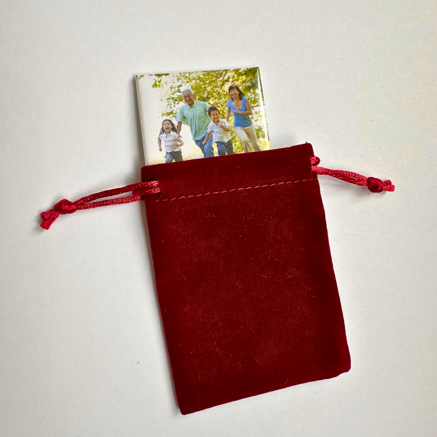 Single custom photo magnet with small pouch – Great for personalized keepsakes.